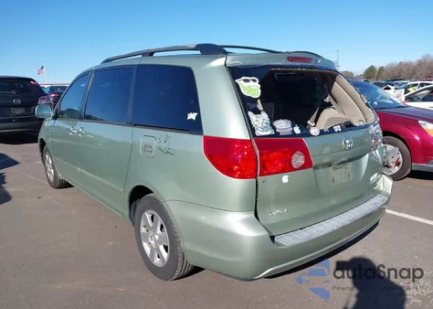 2009 Toyota Sienna Xle z USA, uszkodzony, nr VIN 5TDZK22CX9S229610